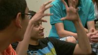 Sernior students are having a discussion.