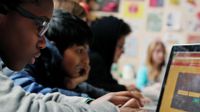 Students are working on their computers.