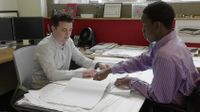 A staff and a student working together