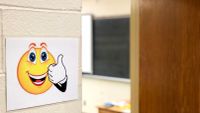 A sign with a smiley face and a thumbs up indicates an open classroom at North Valley Regional in New Jersey.