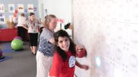 photo of a student using a light wall