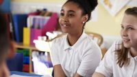 Young girl preparing to speak in class