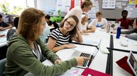 Group of students learning in a classroom