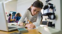 Elementary student studying in laboratory