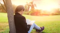 Girl reading in the nature