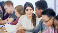 Students talking amongst themselves in a small group