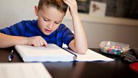 Boy frustrated over math homework