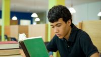 photo of a student reading a book