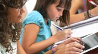 photo of students with tablets