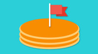 Stack of pancakes with a flag in the middle
