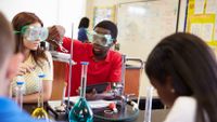Students work together on a lab experiment.