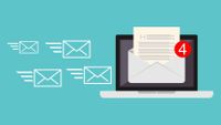 Illustration showing a laptop with email icons flying into it