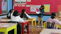 Student presenting in front of the class