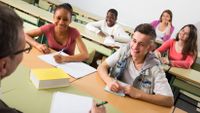 students looking at teacher and laughing