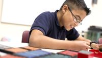 A student at work in class on a project of his choosing