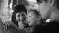 Photo of adult talking with child