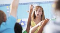 photo of a teacher presenting to a classroom