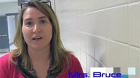 A female teacher standing in a school hallway. The words Mrs. Bruce and Special Education are imposed on the photo.