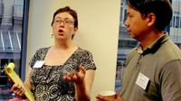 photo of teachers talking with one another