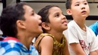 photo of students engaged in listening