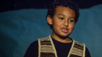 photo of a boy speaking