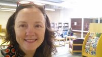 photo of a teacher-librarian in the library