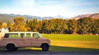 Hood River County School District van with the mountains and trees in the background