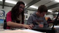 Students are working together as a pair.