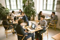 Minerva college students take class from a cafe in Berlin, Germany.