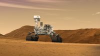A digital illustration of the Curiosity Mars rover traversing a canyon on Mars
