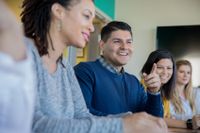 Teachers having an upbeat meeting