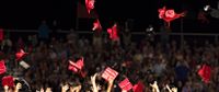 Graduates throwing their caps in the air after graduating