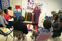 Educators sitting in a circle and talking