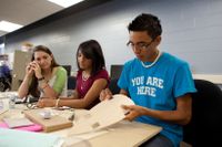 Students work as a team to design and build a class project.