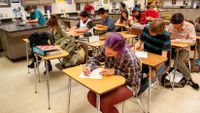 High school science class taking a test