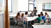 Teacher talking her class