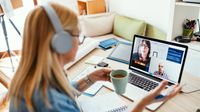 Woman on video work call at home