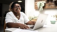 Teacher participates in a video chat at home