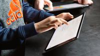 Student uses tablet in classroom