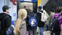 Students entering the elevator at school