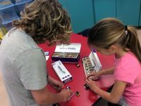 Two girls exploring with littleBits circuits
