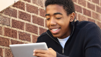 Photo of high school student With iPad