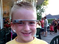 Boy wearing Google Glasses