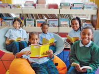 Kids from the New Orleans Book Club in the library