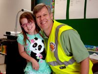 Dad and daughter together smiling