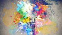 Illustration of a light bulb with splashes of bright paint, representing the flash of creativity