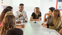 High school students debate in classroom