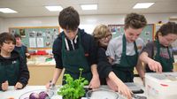 Middle school students in cooking class