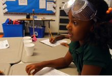 A girl student is in a science class.