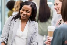 Teachers laughing together